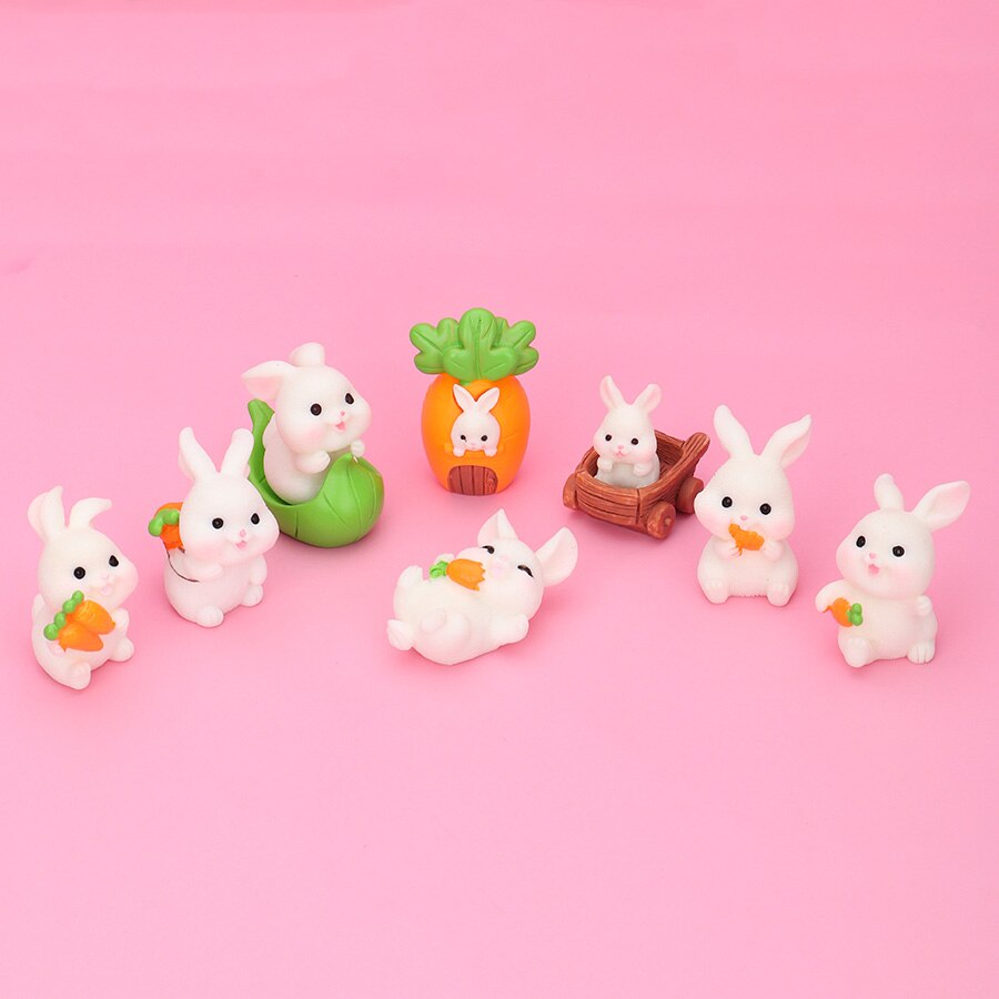 Five rabbit family carrot-leaf boat statues